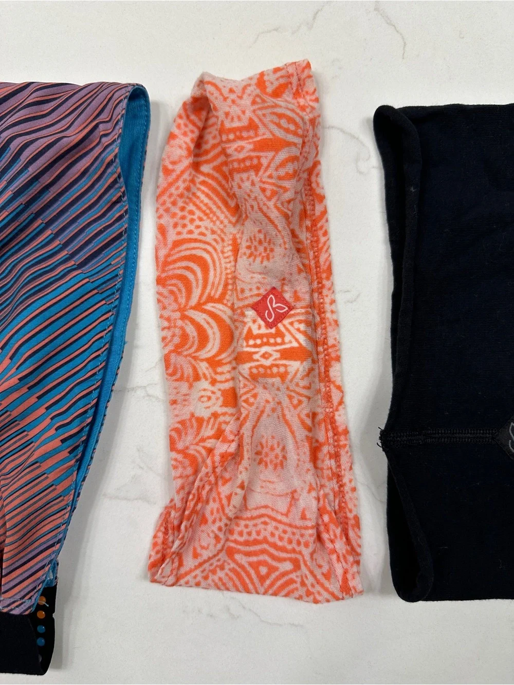 Lot of Women’s headbands- Prana, Injinji, Smartwool